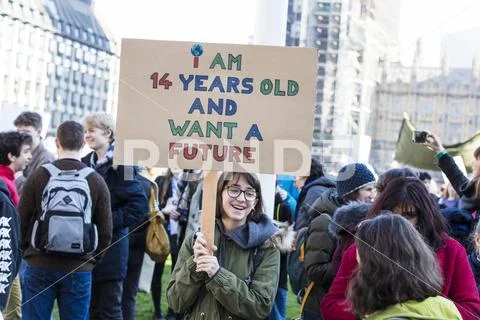 LONDON, UK - February 15, 2019: Protestors at a Youth strike for climate marc Stock Photos