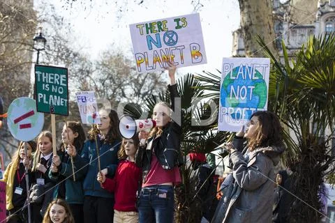 LONDON, UK - February 15, 2019: Protestors at a Youth strike for climate marc Stock Photos