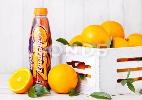 LONDON, UK - MARCH 31, 2018: Plastic bottle of Lucozade orange zero drink Stock Photos