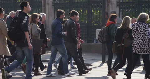 LONDON, UK - OCT 2015: Crowd of people walking across Westminster Bridge. Stock Footage 56070746