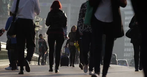 LONDON, UK - OCT 2015: Crowd of people walking across Westminster Bridge. Stock Footage 56081578