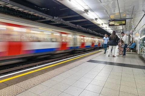 London underground train platform with commuters. London, UK, 21 May 2023 Stock Photos