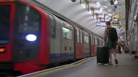 London Underground train pulling into station, UK Stock Footage 247132971