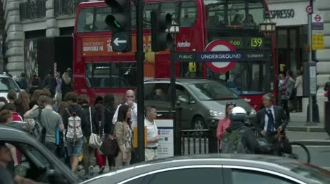 London Underground tube stop Red buses Stock Footage