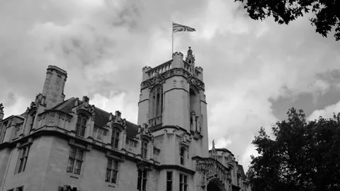 London - the Union Jack waves in the wind - Black &amp; White Stock Footage 232144597