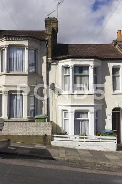 LONDON, UNITED KINGDOM - SEPTEMBER 12 2015: Traditional British houses facade Stock Photos