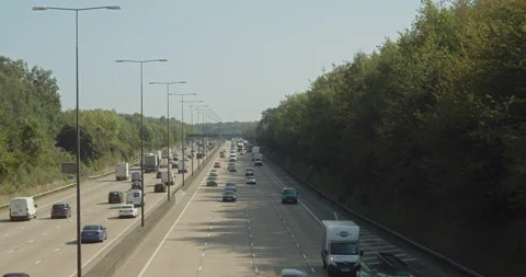London / United Kingdom (UK) - 09 21 2020: Vehicles on the M25 highway. Stock Footage
