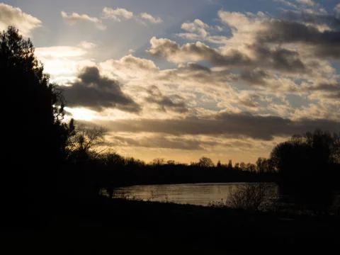 London winter sunset scene - River Thames, taken from Kew Gardens Stock Photos