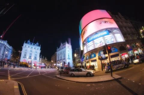 London,nov 27: famous piccadilly circus neon signage shines at night. these s Stock Photos