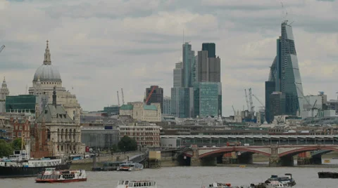 London's River Thames with St. Paul's Cathedral and the City behind Stock Footage