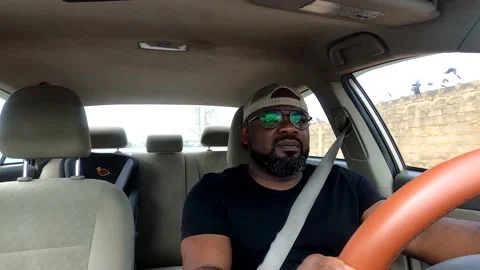 Lone black guy driving Stock Footage 236432389