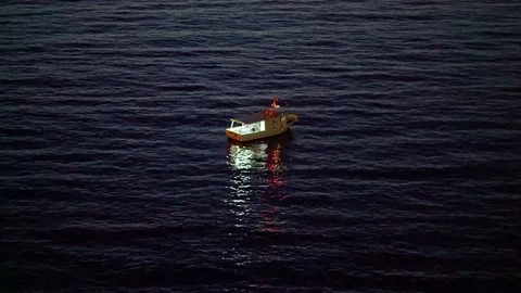 A lone boat at night Video stock 79754192
