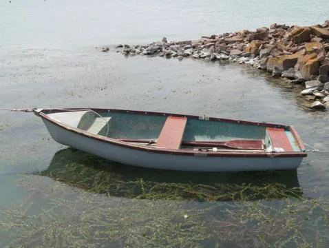 Lone boat Stock Photos