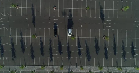 A lone car stands in a large parking lot. Summer. Ukraine. Kyiv. Stock Footage 224565145
