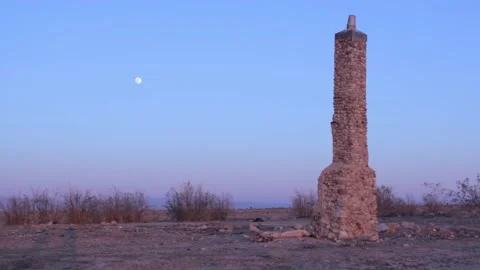 Lone chimney in desert 01 Stock-Footage 130927043