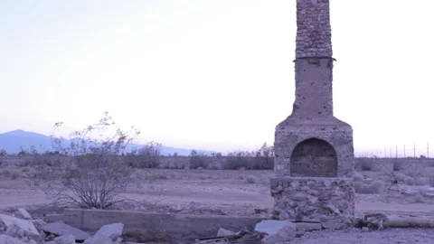 Lone chimney in desert 03 Stock-Footage 130927140
