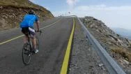 Lone Cyclist Climbing A Slope Paved Road 96 Stock Footage