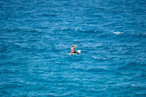 Lone explorer at sea 스톡 사진