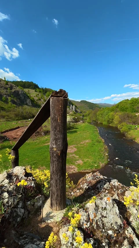 Lone figure walks the path. Temska River, Serbia. Vertical Vidéo 333700939