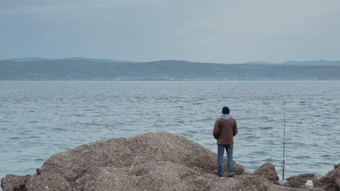 Lone FISHERMAN COMPILATION Stock Footage 87832766