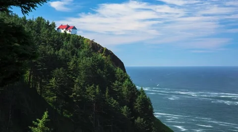 Lone house on cliff overlooking ocean Video stock 40520643