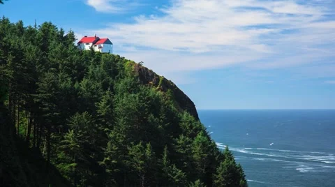 Lone house on cliff overlooking ocean Stock Footage 40522302