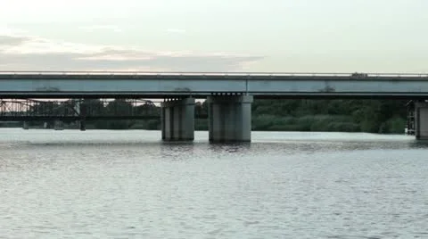 Lone man crossing a bridge Stock Footage 20138633