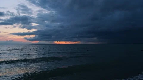 Lone man floating in waves. Видео 249781333