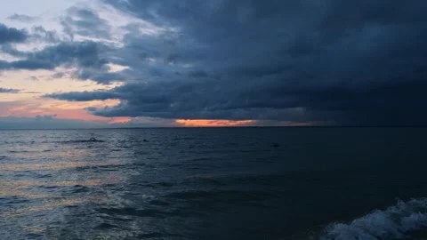 Lone man floating in waves. Stock Footage 253137622