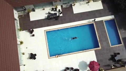 Lone Man Swimming Video stock 299615861