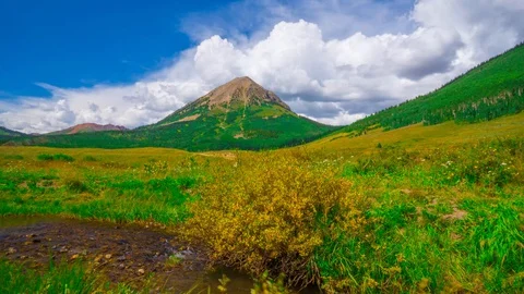 Lone Mountain With Aspens and Stream Time Lapse, Timelapse, Time-Lapse, 4K Stock Footage 128943400