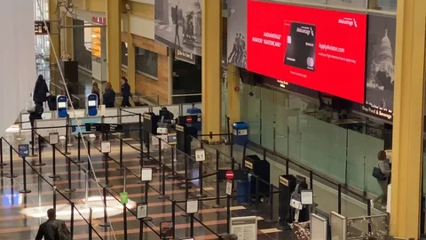 Lone passenger at TSA Checkpoint due to COVID-19 Restrictions Video stock 127670036
