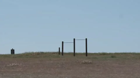 Lone pull up bars in the horizon at the beach Portland OR USA March 10 2025 Stock-Footage 308672025