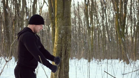 Lone runner in wintry wood, slow motion shot at 180fps Stock Footage 87920623