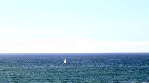 LONE SAILBOAT ON OCEAN Stock Footage 948188