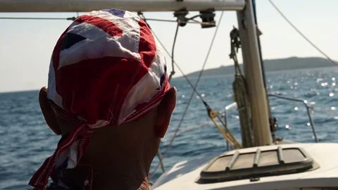 Lone sailor comes ashore Stock Footage 205919184