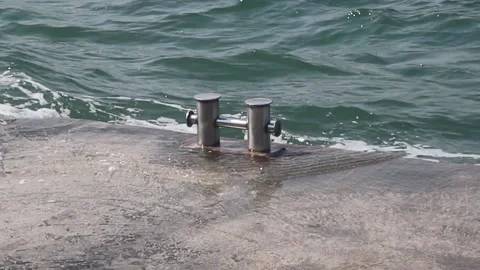 Lone Silver Mooring Pole on the Pier Stock Footage 160983248