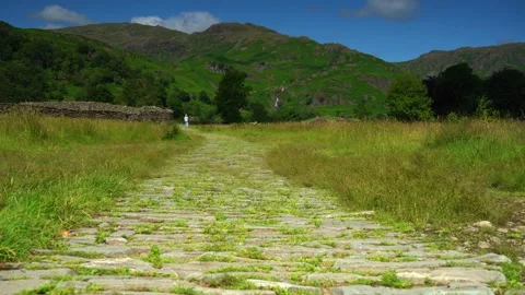 The lone walker beneath the fells Stock Footage 341068267