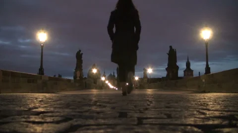 Lone walker on Charles Bridge - Prague, Czech Republic Stock Footage 27273260