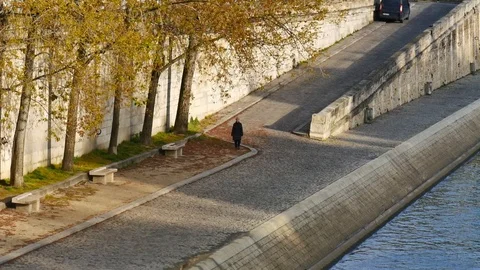 Lone walker on closed docks - covid 19 Stock Footage 127920156