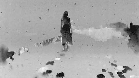 Lone walker in an ink desert, seamless loop Stock Footage 346767246
