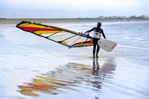 Lone windsurfer getting ready to surf Stock Photos