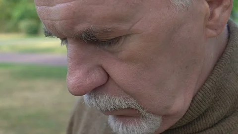 Lonely aged pensioner thinking problem, retirement poverty, pension fund crisis Stock Footage 119011213