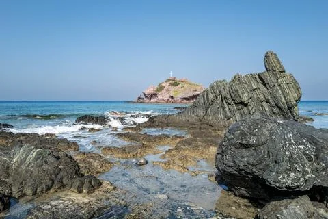 Lonely beach with rocks Foto stock