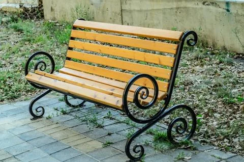 Lonely bench in the park Stock Photos