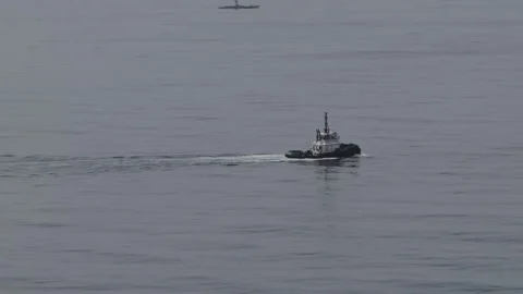 A Lonely Boat Floats Through The Ocean Stock Footage 339712085