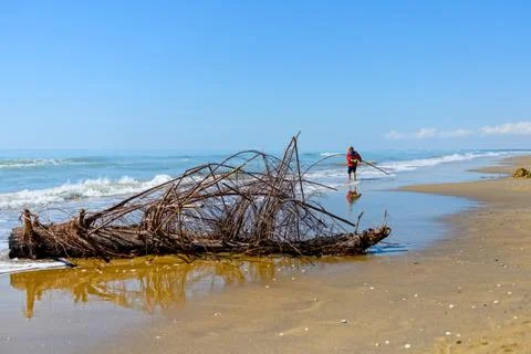 Lonely Boy At The Beach Stock Photos