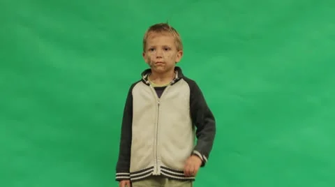 Lonely boy. Child left alone themselves. Homelessness. Greenbox. Stock Footage 8979790