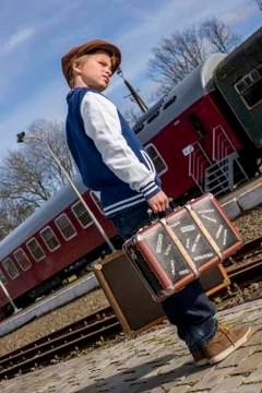Lonely boy waiting on train Stock Photos
