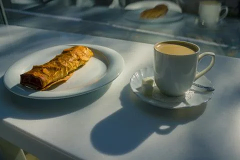 Lonely breakfast in the cafe. Photos